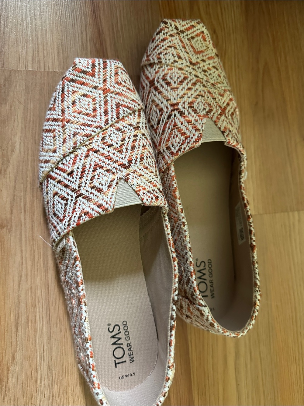 Toms Women's Slip-On Flats in Cream and Orange Geometric Weave